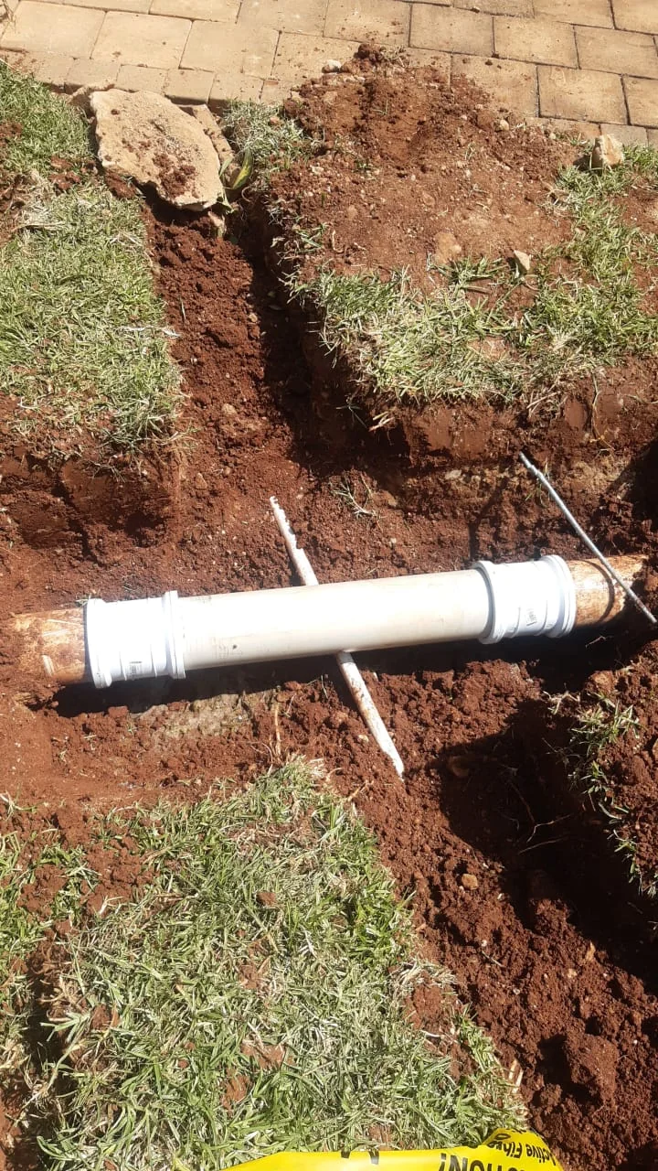Sewer line repaired by replacing a damaged section of pipe in a trench at a Blairgowrie property.