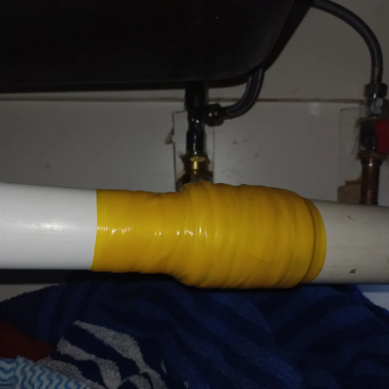 Under-sink pipe repair in Ferndale after a DIY repair left the waste or supply line leaking.
