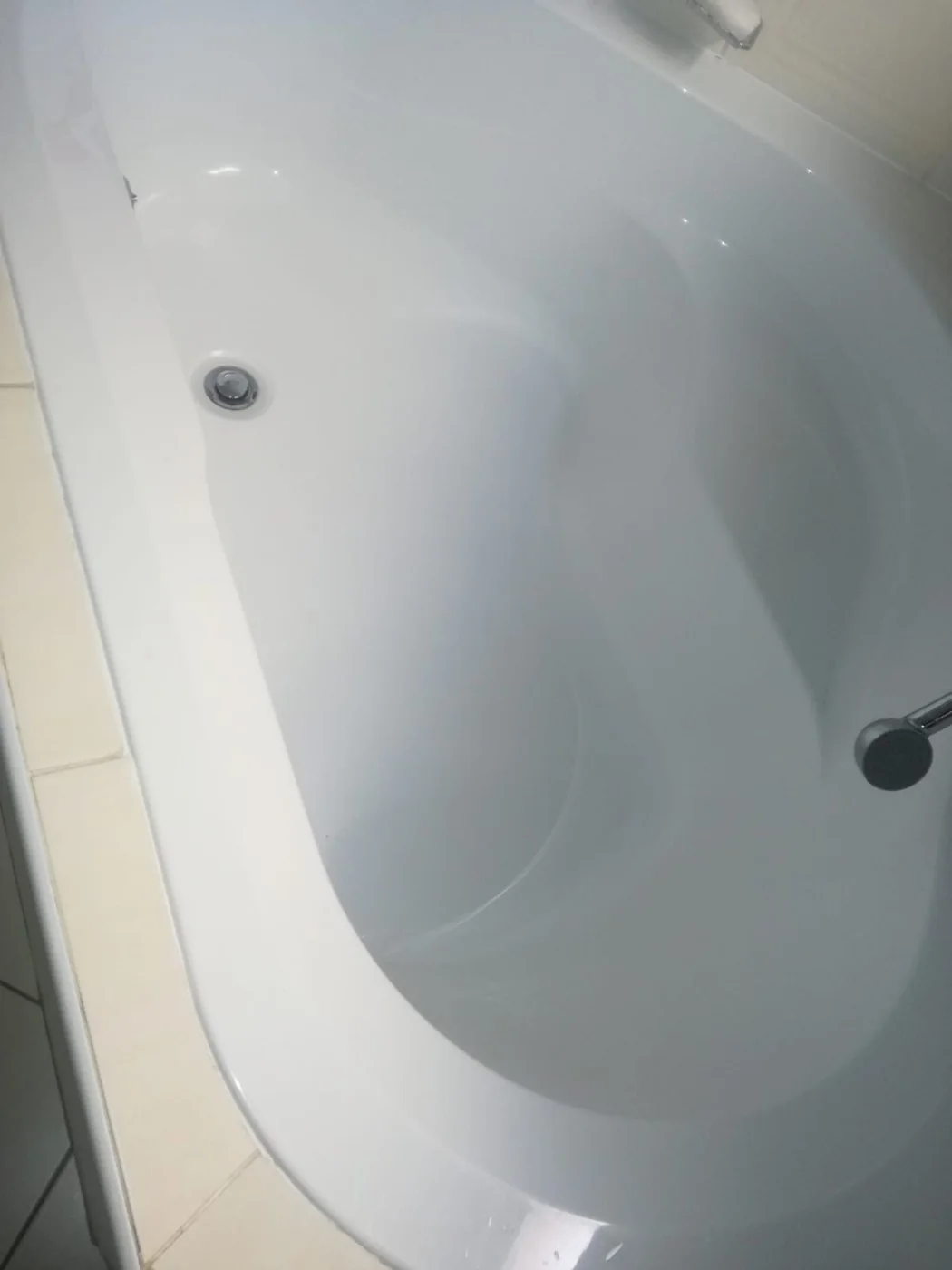 New white bath fitted during a Bromhof bathroom plumbing and tiling job by Plumb A Nator.